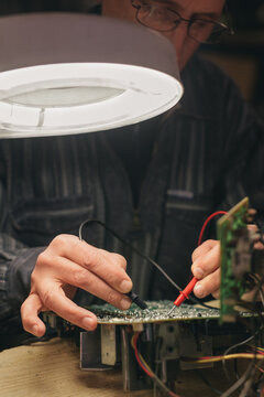 Electrical engineer working on a circuit board
