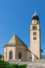 The parish church of San Pancrazio in Glurns, South Tyrol, Italy, on a sunny day