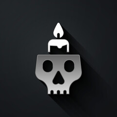 Silver Burning candle on a skull icon isolated on black background. Day of dead. Long shadow style. Vector.