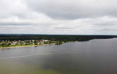 Top view of a calm large forest lake