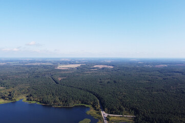 Naklejka premium Top view of a calm large forest lake