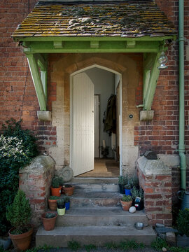 Front door for an understated Hipster Red brick English country House