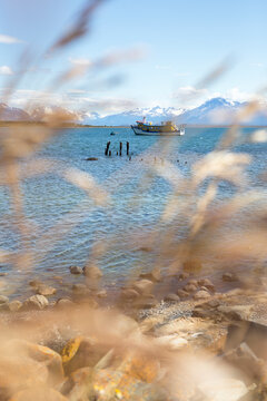 A ship floating in the fjord of Last Hope in fron of Puerto Natales in Chile