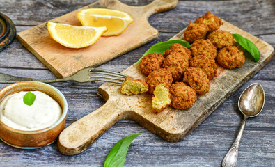  Home made Crispy Chicken   Popcorn with honey mustard sauce on wooden background
