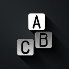 Silver ABC blocks icon isolated on black background. Alphabet cubes with letters A,B,C. Long shadow style. Vector.