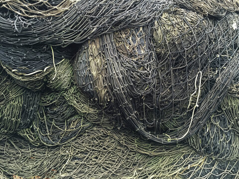 Close up of piles of commercial fishing nets