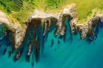 Aerial view over beautiful sea cliffs, surrounded by clear blue sea water, Black sea coast, Bulgaria
