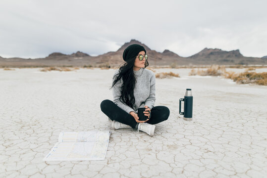 Woman Traveling Through Desert