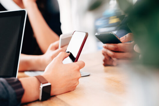 Group of people using smart phones