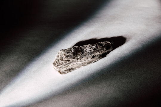 Shiny Sedimentary Rock Illuminated By Beam Of Light