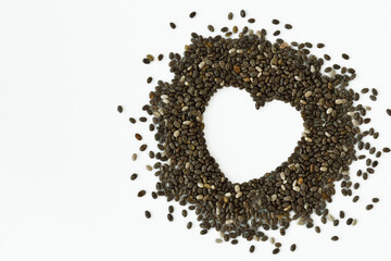 Chia seeds in the shape of heart on white background - Chia seeds are good for heart healthy