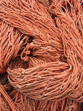 Close up of piles of commercial fishing nets