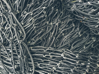 Close up of piles of commercial fishing nets