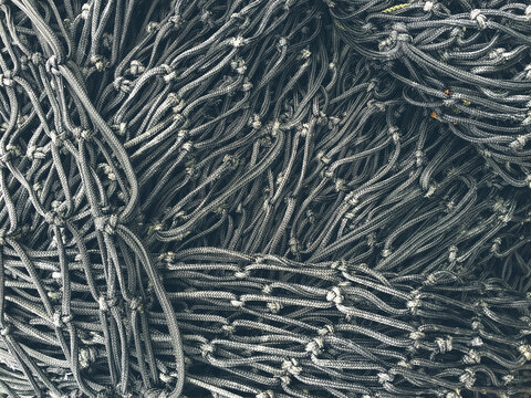 Close up of piles of commercial fishing nets