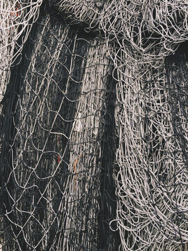 Close up of piles of commercial fishing nets