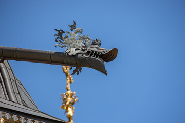 detail on the royal castle in Krakow in Poland against the background of a blue sky