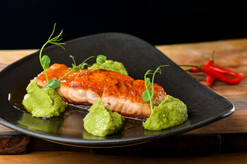Glazed Salmon steak with avocado wasabi purree