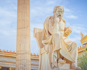 Socrates the ancient Greek philosopher sitting in deep thought statue, Athens Greece
