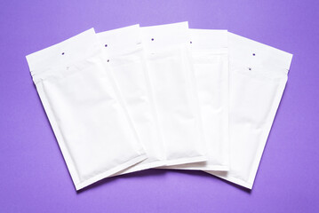 Set of white paper bubble envelopes for postal shipping