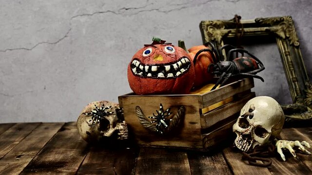 Halloween decoration. Trick or treat in autumn and fall season. Pumpkin face and scary symbol at home.