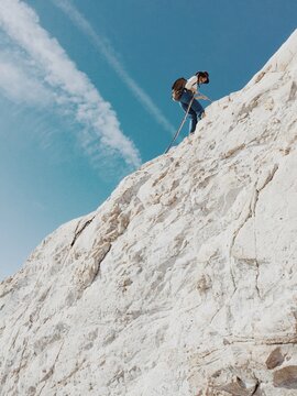 Woman Rappels Down Rock to Secret Beach