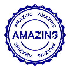 Grunge blue amazing word round rubber seal stamp on white background