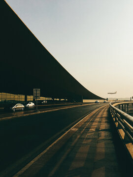 Plan Landing Behing Modern Airport