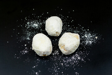 White cookies in powdered sugar