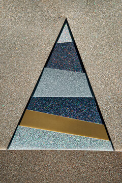 Striped triangle made of shiny glitter
