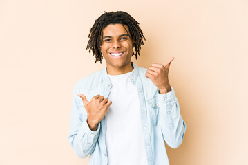Young african american rasta man raising both thumbs up, smiling and confident.