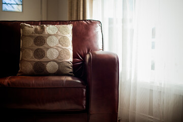 Comfy leather sofa with cushion