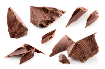 Broken chocolate pieces isolated. Chocolate chunks on white. Broken chocolate pieces set macro.