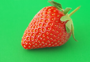 Strawberry on a green background