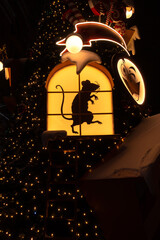 The character from the fairy tale Nutcracker. Mouse silhouette in the window