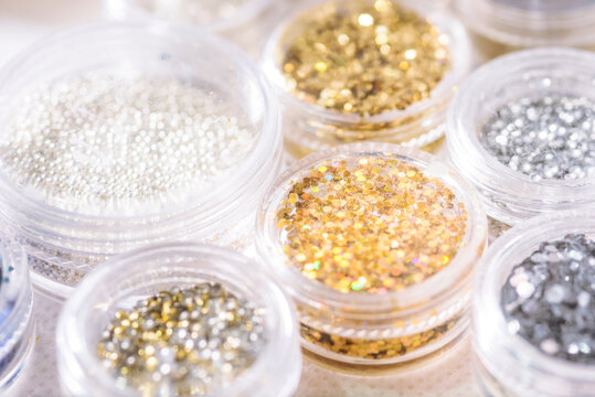 Manicure colorful accessories in jars