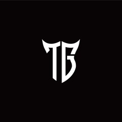 Initial T G letter with unique shield style logo template vector