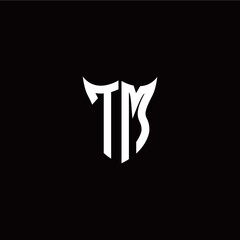 Initial T M letter with unique shield style logo template vector