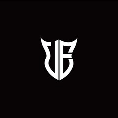Initial U E letter with unique shield style logo template vector