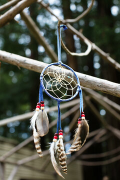 Dream catcher hanging on a wood structure at a trailer park