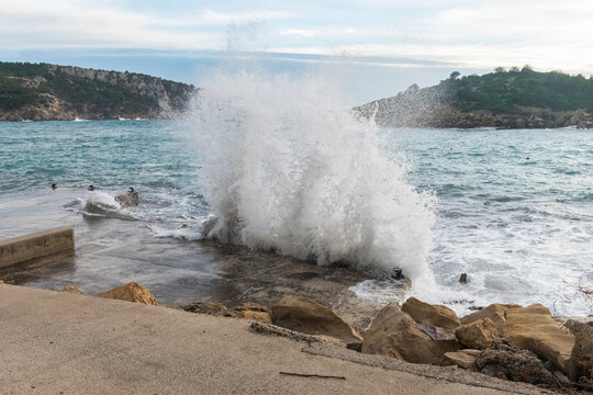 Wave hitting a dock