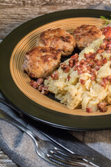 Minced meat cutlets with boiled sauerkraut.