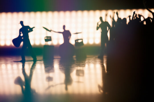 Rock band and clapping hands