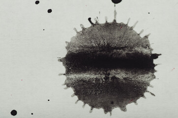 Black abstract ink painting on white paper
