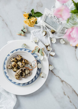 Easter table with flowers and butterflies
