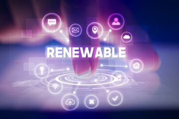 Finger touching tablet with web technology icons and RENEWABLE inscription, web technology concept