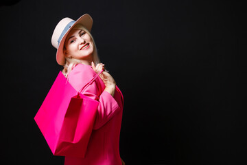 woman with shopping bags on black friday