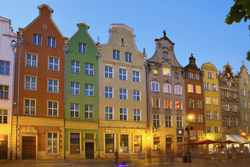 Fototapeta na wymiar Nightlife of illuminated Gdansk streets, Poland