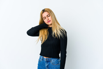 Young blonde woman isolated on white background having a neck pain due to stress, massaging and touching it with hand.