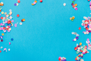 confetti on blue background, color background
