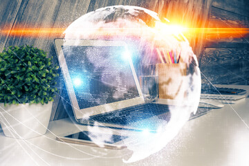 Multi exposure of business theme icons and table with computer background. Concept of success.